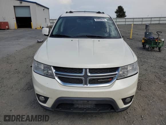 2013 Dodge Journey R/T with VIN 3C4PDDFG0DT708627, listed as a Copart auction lot 66959915 with 228,491 mi miles and Salvage title. Bid and sale history available at DreamBid. Image 5.