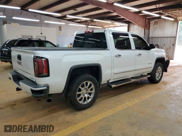 2016 GMC Sierra 1500 Denali z VIN 3GTU2PEJ1GG221537, wystawiony jako Copart lot #80850875 z przebiegiem Nie podano mil oraz Szkoda całkowita • Salvage title. Historia ofert i sprzedaży dostępna na DreamBid. Obrazek 3.
