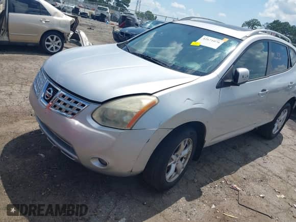 2009 Nissan Rogue SL z VIN JN8AS58T29W054604, wystawiony jako IAAI lot #42671076 z przebiegiem 208 276 mil mil oraz . Historia ofert i sprzedaży dostępna na DreamBid. Obrazek 2.