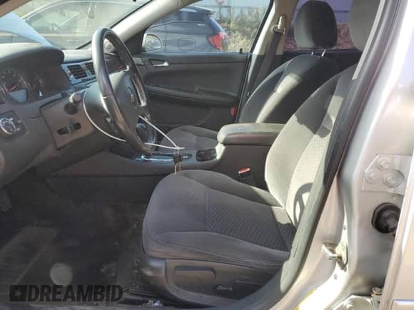 2013 Chevrolet Impala LT with VIN 2G1WB5E38D1169187, listed as a Copart auction lot 87256215 with 150,077 mi miles and Clean title. Bid and sale history available at DreamBid. Image 7.