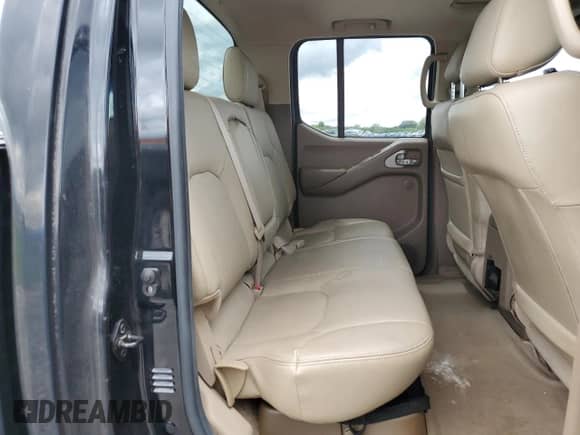 2005 Nissan Frontier SE with VIN 1N6AD07U15C424064, listed as a Copart auction lot 68090785 with 153,296 mi miles and Salvage title. Bid and sale history available at DreamBid. Image 10.