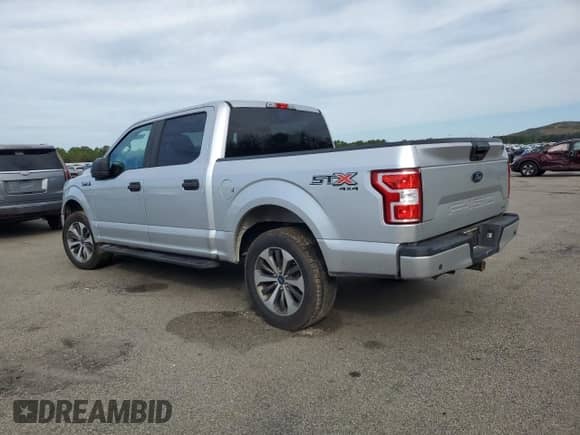 2019 Ford F-150 XLT with VIN 1FTEW1EPXKFA48640, listed as a Copart auction lot 81245545 with 142,469 mi miles and Salvage title. Bid and sale history available at DreamBid. Image 2.