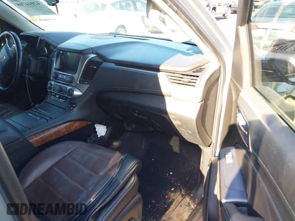 2019 Chevrolet Suburban Premier with VIN 1GNSCJKC3KR129739, listed as a IAAI auction lot 42044708 with 105,771 mi miles and . Bid and sale history available at DreamBid. Image 5.