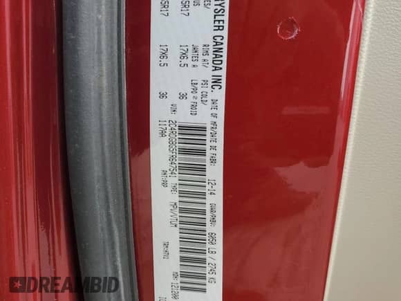 2015 Dodge Grand Caravan American Value with VIN 2C4RDGBG5FR647541, listed as a Copart auction lot 85539445 with 148,285 mi miles and Salvage title. Bid and sale history available at DreamBid. Image 14.