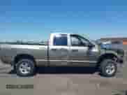 2006 Dodge 1500 SLT z VIN 1D7HU18236S628902, wystawiony jako IAAI lot #43155885 z przebiegiem Nie podano mil oraz . Historia ofert i sprzedaży dostępna na DreamBid. Obrazek 13.