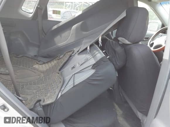 2005 Hyundai Tucson GL z VIN KM8JM12B15U098822, wystawiony jako IAAI lot #42993930 z przebiegiem 191 684 mil mil oraz . Historia ofert i sprzedaży dostępna na DreamBid. Obrazek 8.