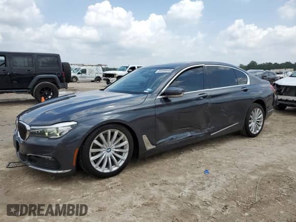 2018 BMW 7 Series 740i с VIN WBA7E2C59JG742261, выставлен на аукционе Copart как лот 54444445 с пробегом 143 587 миль миль и Чистый • Clean title. История ставок и продаж доступна на DreamBid. Изображение 1.
