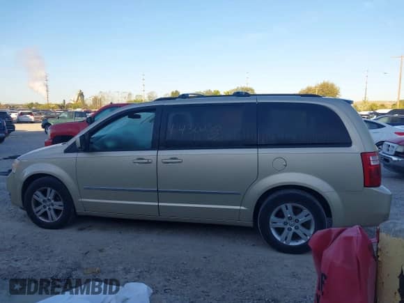 2010 Dodge Grand Caravan Crew with VIN 2D4RN6DX4AR477799, listed as a IAAI auction lot 43430280 with 179,681 mi miles and . Bid and sale history available at DreamBid. Image 14.