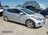 2011 Hyundai Elantra GLS z VIN KMHDH4AE7BU154997, wystawiony jako Copart lot #66558955 z przebiegiem 165 913 mil mil oraz Szkoda całkowita • Salvage title. Historia ofert i sprzedaży dostępna na DreamBid. Obrazek 4.