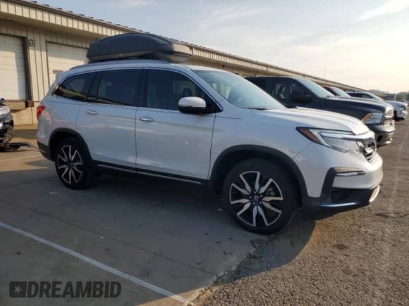 2022 Honda Pilot Touring 7-Passenger with VIN 5FNYF5H61NB003005, listed as a Copart auction lot 66857355 with 49,813 mi miles and Salvage title. Bid and sale history available at DreamBid. Image 4.