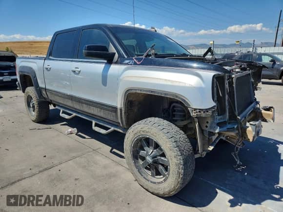 2015 GMC Sierra 1500 SLE z VIN 3GTU2UEC2FG232710, wystawiony jako Copart lot #68812915 z przebiegiem 119 685 mil mil oraz Szkoda całkowita • Salvage title. Historia ofert i sprzedaży dostępna na DreamBid. Obrazek 4.