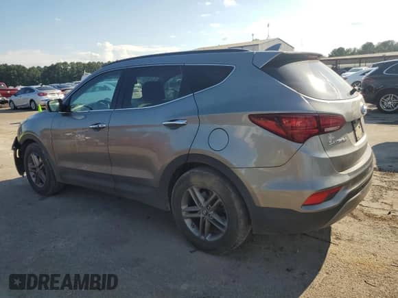 2017 Hyundai Santa Fe 2.4L z VIN 5NMZU3LB6HH038970, wystawiony jako Copart lot #69933835 z przebiegiem 174 618 mil mil oraz Szkoda całkowita • Salvage title. Historia ofert i sprzedaży dostępna na DreamBid. Obrazek 2.