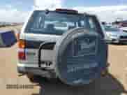 1995 Nissan Pathfinder LE z VIN JN8HD17Y6SW053525, wystawiony jako Copart lot #67064564 z przebiegiem 196 174 mil mil oraz Szkoda całkowita • Salvage title. Historia ofert i sprzedaży dostępna na DreamBid. Obrazek 6.