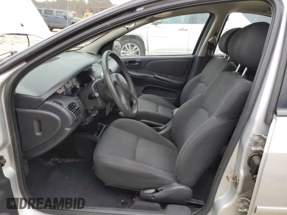 2004 Dodge Neon SXT with VIN 1B3ES56C54D628554, listed as a Copart auction lot 73219764 with 67,373 mi miles and Salvage title. Bid and sale history available at DreamBid. Image 7.