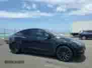 2023 Tesla Model Y Performance z VIN 7SAYGDEF0PF958265, wystawiony jako Copart lot #65881755 z przebiegiem 9 581 mil mil oraz Szkoda całkowita • Salvage title. Historia ofert i sprzedaży dostępna na DreamBid. Obrazek 13.
