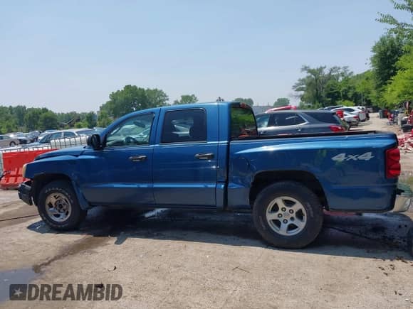 2005 Dodge Dakota SLT with VIN 1D7HW48N25S112499, listed as a IAAI auction lot 42434700 with 216,817 mi miles and . Bid and sale history available at DreamBid. Image 15.