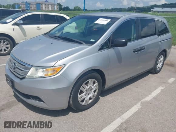 2012 Honda Odyssey LX z VIN 5FNRL5H22CB009516, wystawiony jako IAAI lot #42802505 z przebiegiem 197 516 mil mil oraz . Historia ofert i sprzedaży dostępna na DreamBid. Obrazek 18.