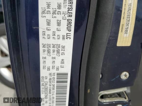 2014 Jeep Compass Sport z VIN 1C4NJCBB3ED679460, wystawiony jako Copart lot #87197415 z przebiegiem 117 309 mil mil oraz Szkoda całkowita • Salvage title. Historia ofert i sprzedaży dostępna na DreamBid. Obrazek 14.