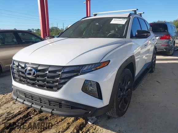 2023 Hyundai Tucson XRT with VIN KM8JF3AE0PU205881, listed as a IAAI auction lot 40936675 with 9,551 mi miles and . Bid and sale history available at DreamBid. Image 2.