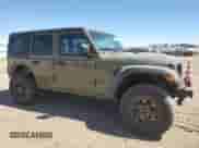 2025 Jeep Wrangler Sport S с VIN 1C4RJXN64SW512371, выставлен на аукционе Copart как лот 66344275 с пробегом 3 484 миль миль и Списание • Salvage title. История ставок и продаж доступна на DreamBid. Изображение 4.