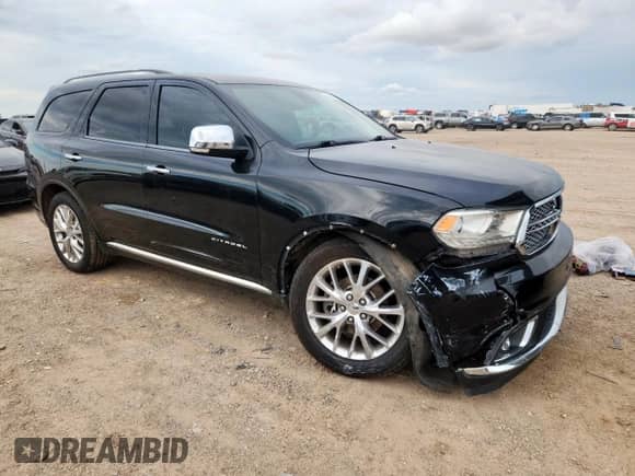 2014 Dodge Durango Citadel with VIN 1C4RDHEG3EC367738, listed as a Copart auction lot 63018345 with 158,547 mi miles and Salvage title. Bid and sale history available at DreamBid. Image 4.