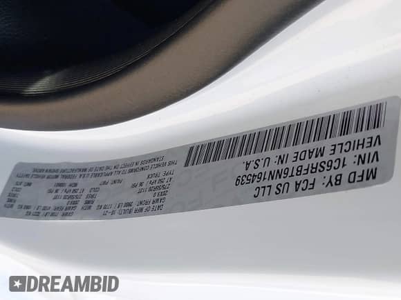 2022 Ram 1500 Big Horn with VIN 1C6SRFBT6NN164539, listed as a IAAI auction lot 42444414 with 54,343 mi miles and . Bid and sale history available at DreamBid. Image 9.