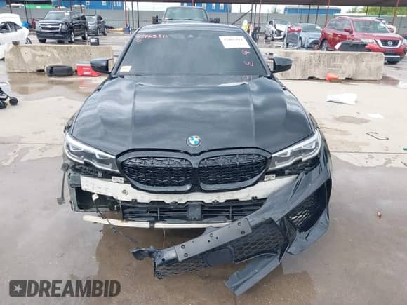 2020 BMW 3 Series 330i with VIN 3MW5R1J01L8B23880, listed as a IAAI auction lot 42865811 with Not provided miles and . Bid and sale history available at DreamBid. Image 12.