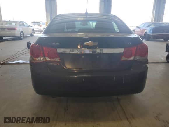 2014 Chevrolet Cruze 2LT with VIN 1G1PE5SB8E7192366, listed as a Copart auction lot 84898895 with 194,255 mi miles and Clean title. Bid and sale history available at DreamBid. Image 6.
