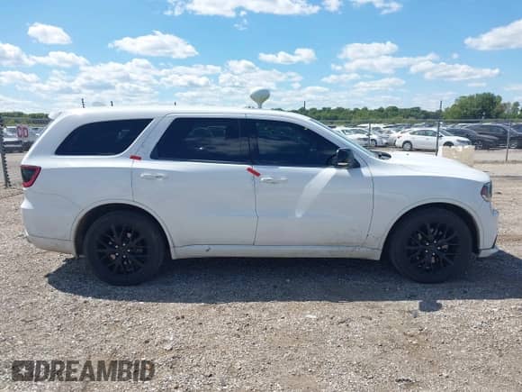 2015 Dodge Durango R/T with VIN 1C4SDJCT6FC917752, listed as a IAAI auction lot 43093399 with 175,337 mi miles and . Bid and sale history available at DreamBid. Image 13.