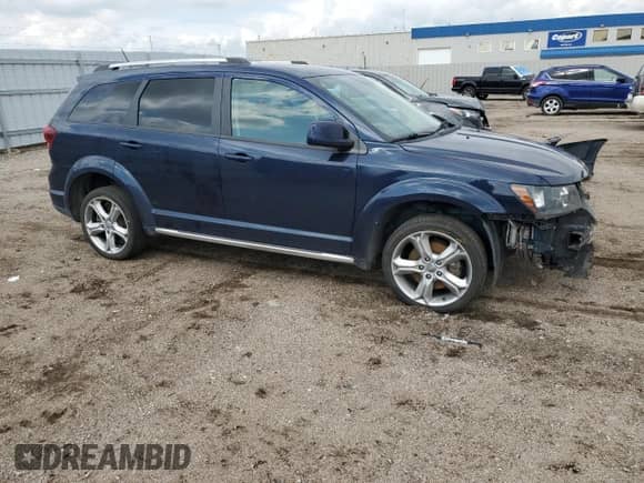 2017 Dodge Journey Crossroad with VIN 3C4PDCGB0HT599010, listed as a Copart auction lot 58535775 with 129,735 mi miles and Salvage title. Bid and sale history available at DreamBid. Image 4.