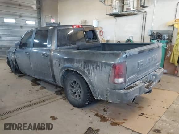 2018 Ram 1500 Rebel with VIN 1C6RR7YT1JS234777, listed as a IAAI auction lot 41409525 with 119,497 mi miles and . Bid and sale history available at DreamBid. Image 3.