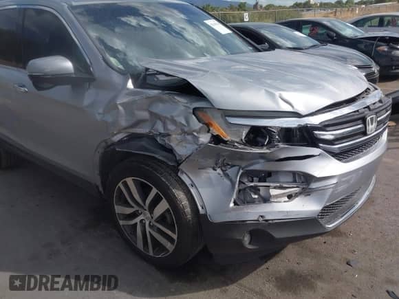 2016 Honda Pilot Touring z VIN 5FNYF6H94GB012204, wystawiony jako IAAI lot #43166328 z przebiegiem 108 897 mil mil oraz . Historia ofert i sprzedaży dostępna na DreamBid. Obrazek 6.