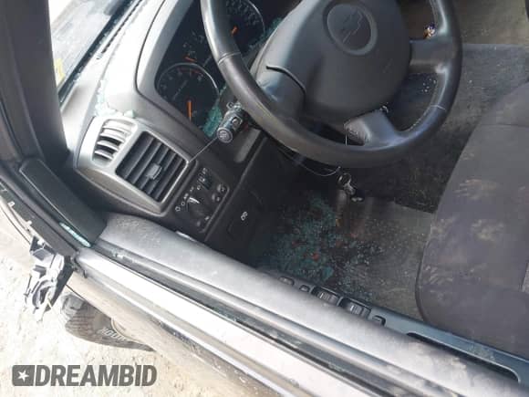 2012 Chevrolet Colorado 1LT z VIN 1GCHTCFE9C8124773, wystawiony jako IAAI lot #43053601 z przebiegiem 150 872 mil mil oraz . Historia ofert i sprzedaży dostępna na DreamBid. Obrazek 18.