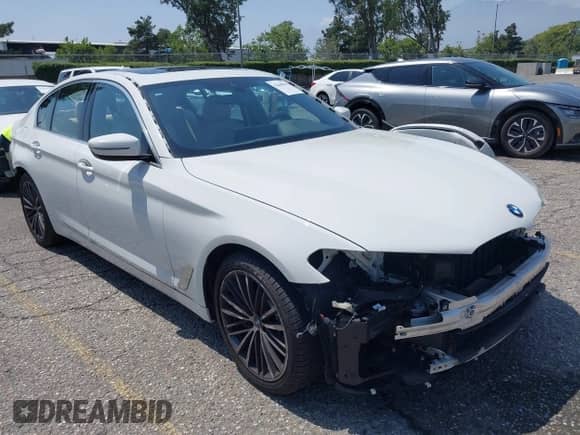 2023 BMW 5 Series 530i with VIN WBA53BH04PCN60302, listed as a IAAI auction lot 42440610 with 23,553 mi miles and . Bid and sale history available at DreamBid. Image 1.