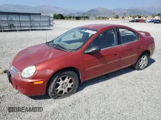 2005 Dodge Neon SXT with VIN 1B3ES56C75D186166, listed as a Copart auction lot 57673335 with 131,345 mi miles and Salvage title. Bid and sale history available at DreamBid. Image 1.