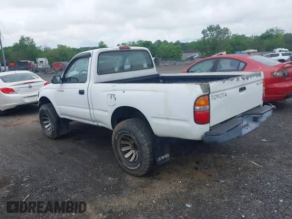 2002 Toyota Tacoma with VIN 5TEPM62N72Z033143, listed as a IAAI auction lot 42181747 with 217,872 mi miles and . Bid and sale history available at DreamBid. Image 3.