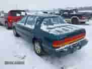 1993 Dodge Spirit with VIN 1B3XA46K5PF605264, listed as a IAAI auction lot 41561970 with 94,670 mi miles and . Bid and sale history available at DreamBid. Image 3.