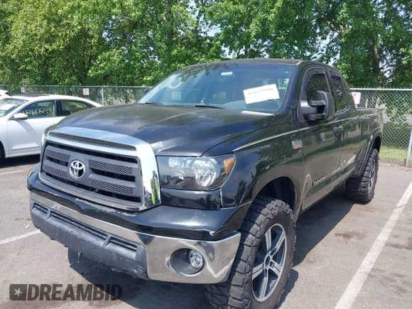2012 Toyota Tundra z VIN 5TFRY5F10CX117652, wystawiony jako IAAI lot #42617080 z przebiegiem 233 560 mil mil oraz . Historia ofert i sprzedaży dostępna na DreamBid. Obrazek 19.