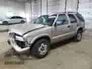 2002 Chevrolet Blazer LS с VIN 1GNDT13W42K189958, выставлен на аукционе Copart как лот 65765625 с пробегом Не указан миль и На запчасти • Non repairable. История ставок и продаж доступна на DreamBid. Изображение 1.