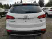 2015 Hyundai Santa Fe with VIN 5XYZTDLB4FG237483, listed as a Copart auction lot 68867815 with 113,007 mi miles and Clean title. Bid and sale history available at DreamBid. Image 6.