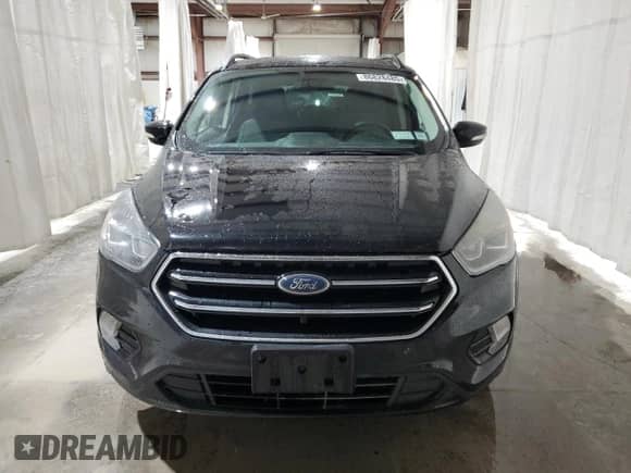 2017 Ford Escape Titanium с VIN 1FMCU9JD2HUD17267, выставлен на аукционе Copart как лот 86828485 с пробегом 72 989 миль миль и Списание • Salvage title. История ставок и продаж доступна на DreamBid. Изображение 5.
