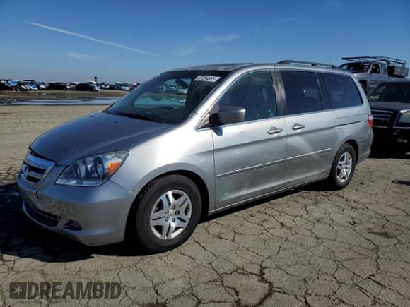 2007 Honda Odyssey EX-L с VIN 5FNRL38767B121645, выставлен на аукционе Copart как лот 87224365 с пробегом 167 747 миль миль и Списание • Salvage title. История ставок и продаж доступна на DreamBid. Изображение 1.