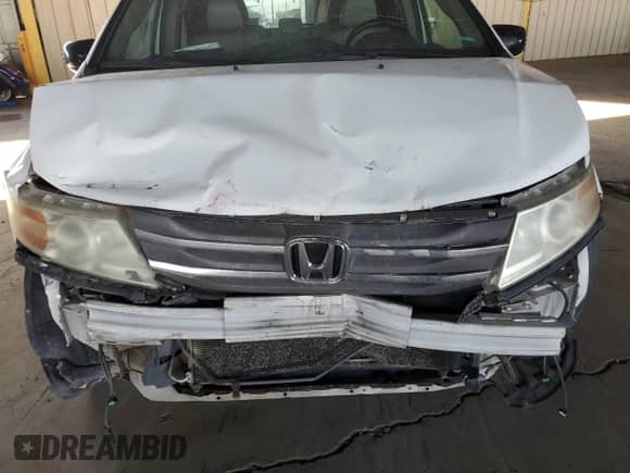 2011 Honda Odyssey Touring с VIN 5FNRL5H90BB029226, выставлен на аукционе Copart как лот 84238665 с пробегом Не указан миль и Чистый • Clean title. История ставок и продаж доступна на DreamBid. Изображение 12.