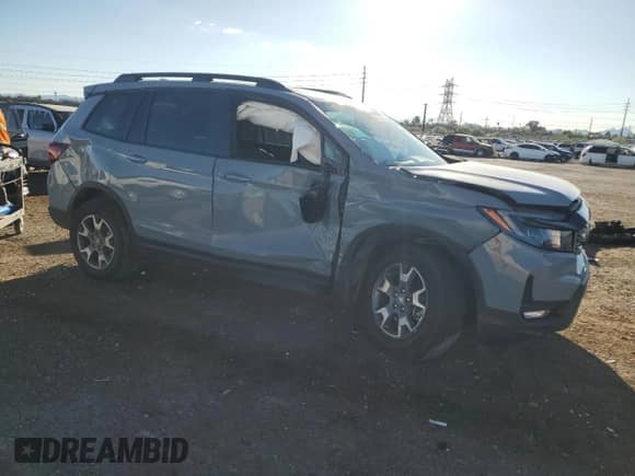 2022 Honda Passport TrailSport with VIN 5FNYF8H64NB025971, listed as a Copart auction lot 82236885 with 28,874 mi miles and Salvage title. Bid and sale history available at DreamBid. Image 4.