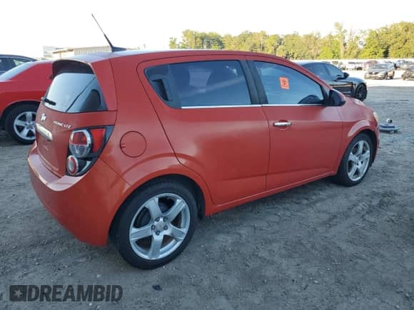 2012 Chevrolet Sonic LTZ с VIN 1G1JF6SH5C4110539, выставлен на аукционе Copart как лот 74803564 с пробегом 147 312 миль миль и Чистый • Clean title. История ставок и продаж доступна на DreamBid. Изображение 3.