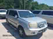 2010 Honda Pilot Touring with VIN 5FNYF3H94AB022723, listed as a IAAI auction lot 42378211 with 326,338 mi miles and . Bid and sale history available at DreamBid. Image 1.