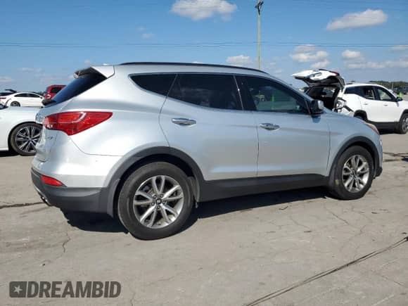 2015 Hyundai Santa Fe z VIN 5XYZU3LA3FG282803, wystawiony jako Copart lot #82160215 z przebiegiem 85 391 mil mil oraz Szkoda całkowita • Salvage title. Historia ofert i sprzedaży dostępna na DreamBid. Obrazek 3.