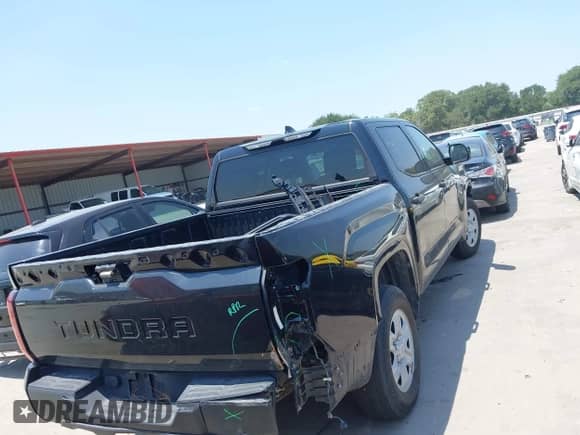 2022 Toyota Tundra SR with VIN 5TFKB5AB7NX017988, listed as a IAAI auction lot 42986871 with 50,437 mi miles and . Bid and sale history available at DreamBid. Image 16.