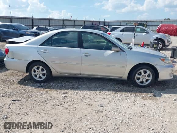 2005 Toyota Camry STD with VIN 4T1BE32K95U414156, listed as a IAAI auction lot 42774820 with 203,235 mi miles and . Bid and sale history available at DreamBid. Image 13.