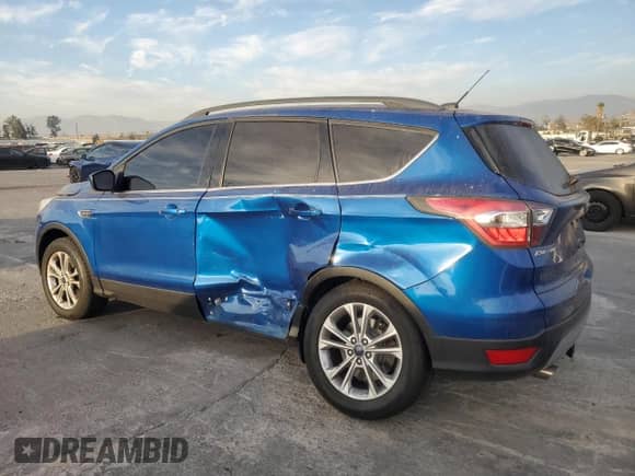 2017 Ford Escape SE с VIN 1FMCU9G9XHUA11145, выставлен на аукционе Copart как лот 86125734 с пробегом 106 846 миль миль и Чистый • Clean title. История ставок и продаж доступна на DreamBid. Изображение 2.